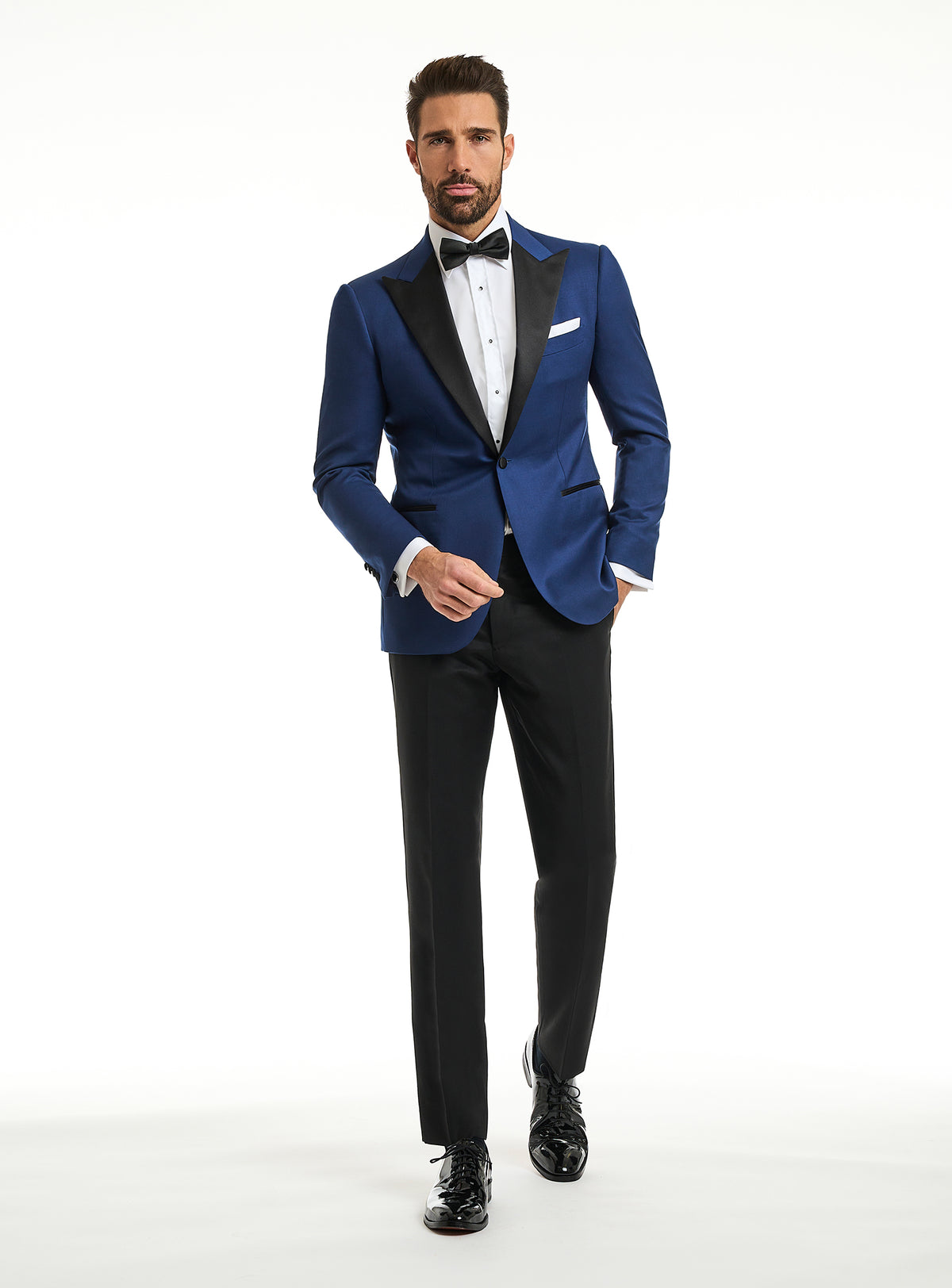 Consiglieri: rich blue tuxedo jacket with black lapels and black trousers