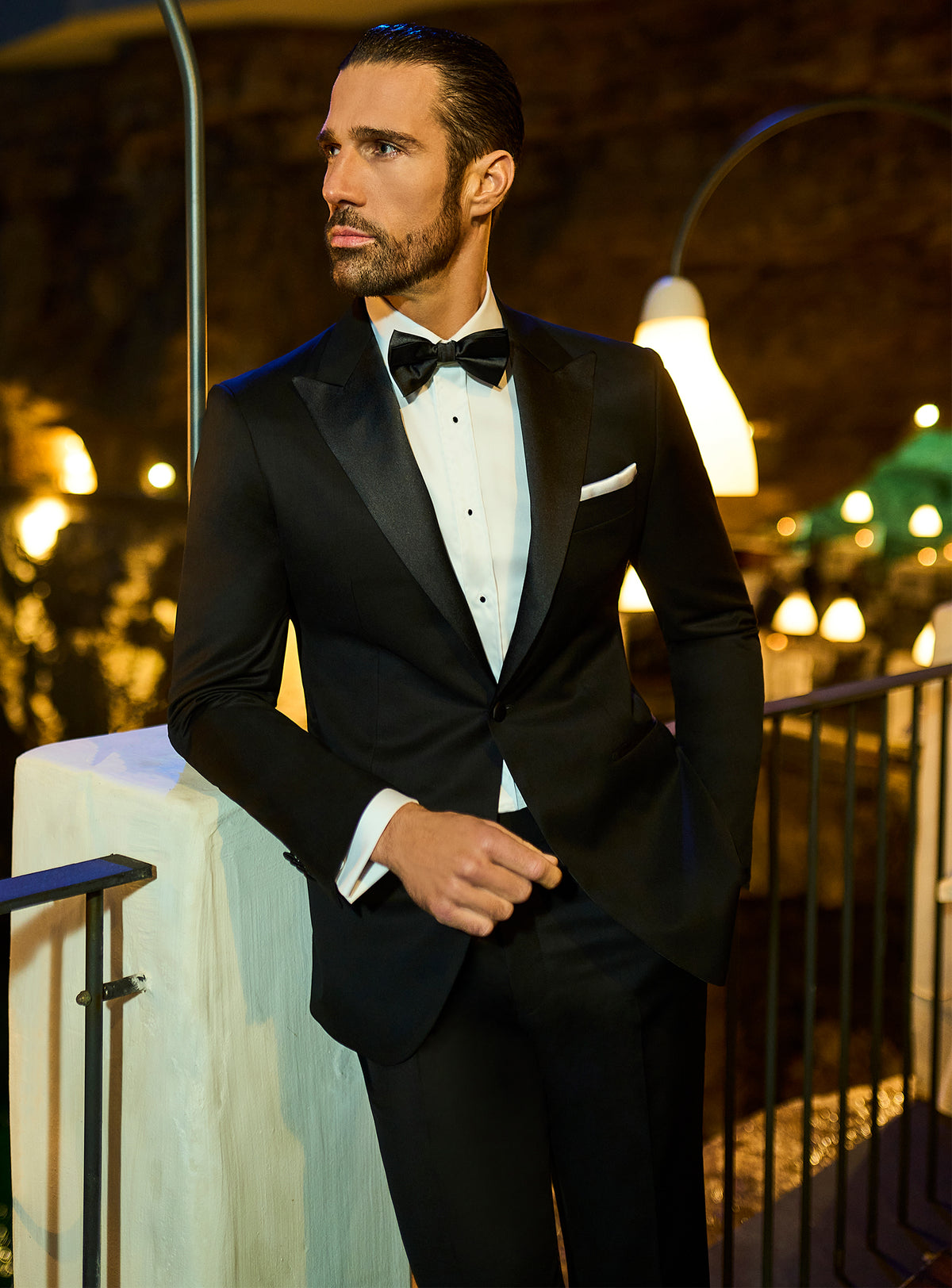 Consiglieri: black tuxedo with lustrous shawl lapels and a bow tie
