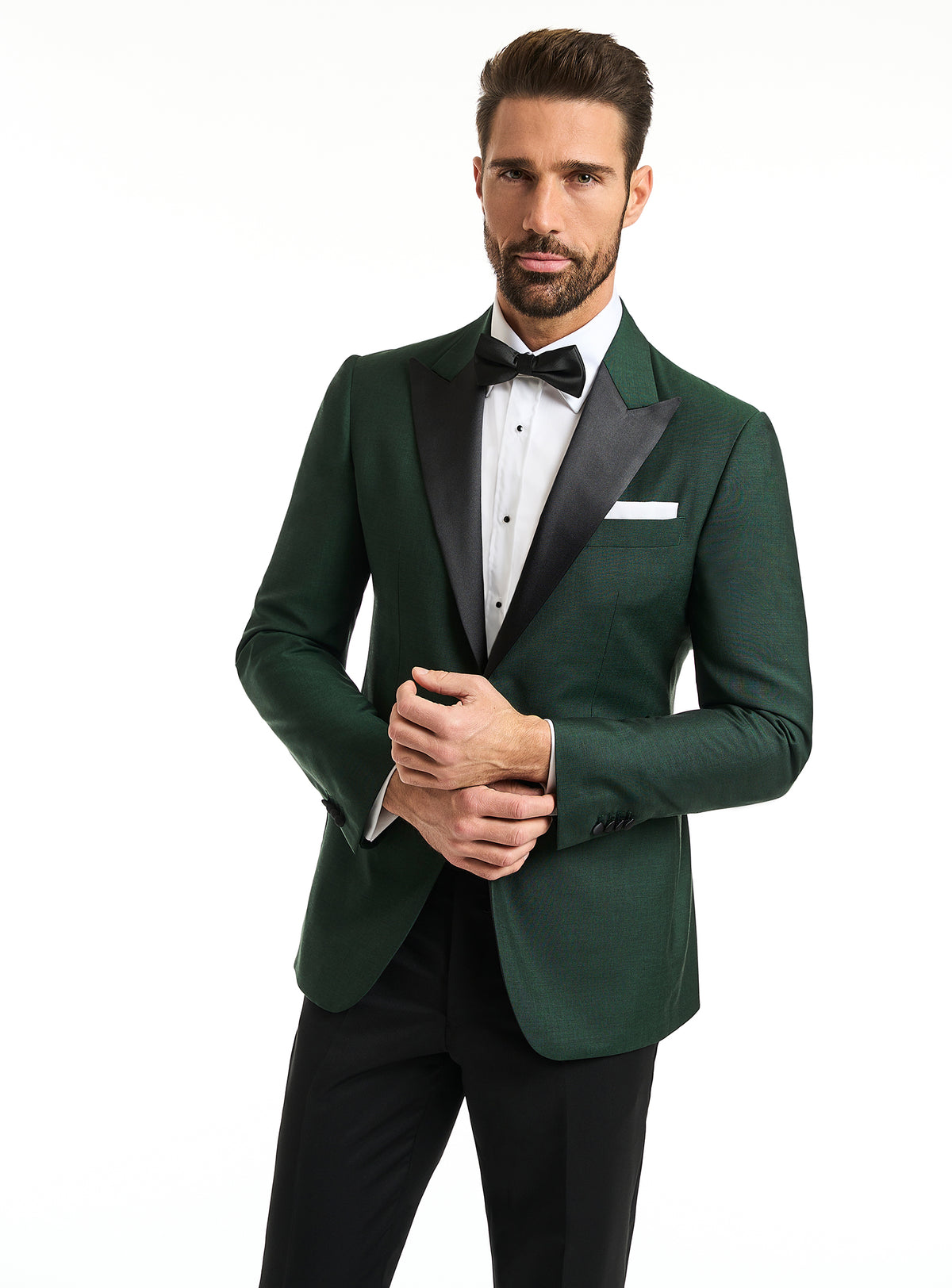 Consiglieri: emerald green tuxedo jacket with black lapels and black trousers