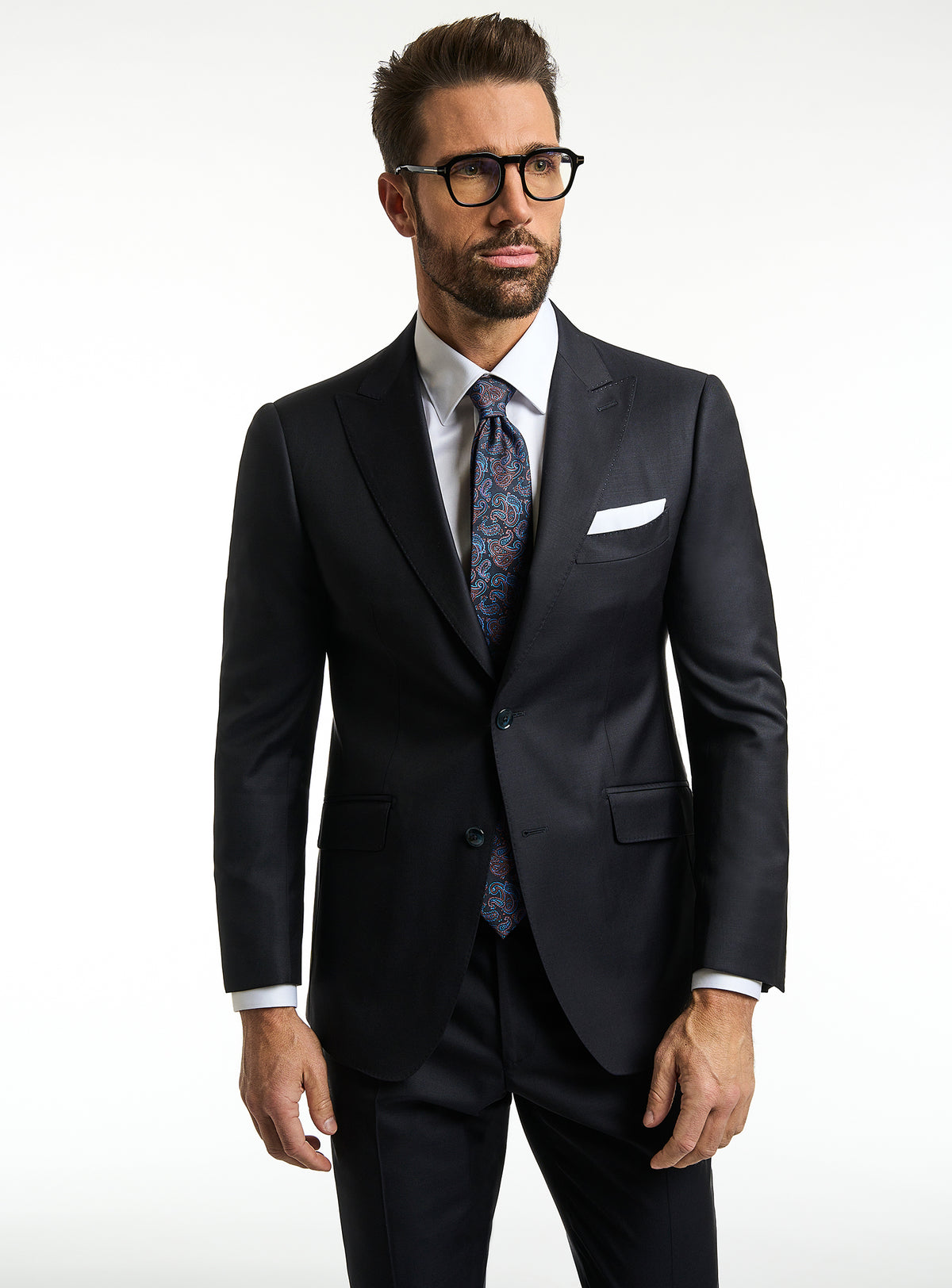 Consiglieri EliteExec: dark suit with a white shirt and patterned tie