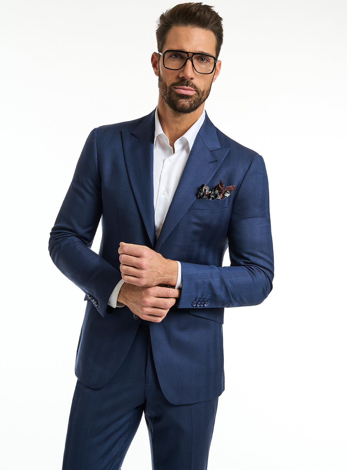 Consiglieri DapperDirector Line: blue suit with a white shirt and patterned pocket square