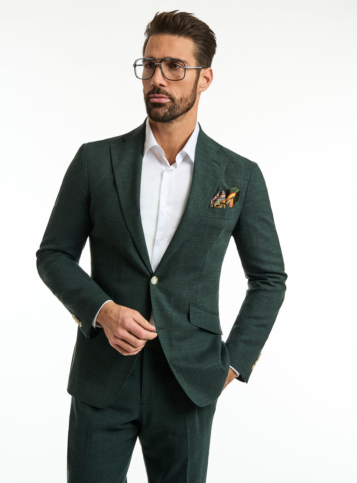 Consiglieri Verona Class: dark green suit with a white shirt and contrasting pocket square