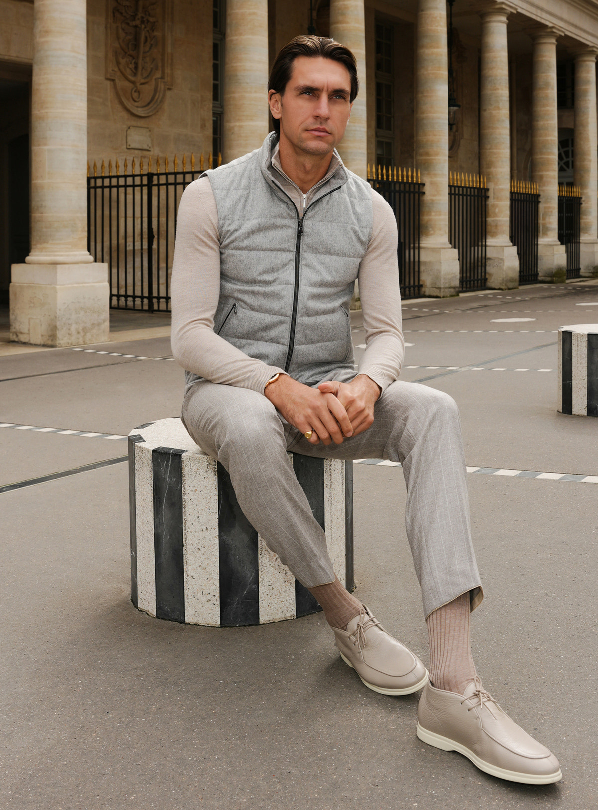 Grey Consiglieri gilet with cream trousers and loafers in a light tonal ensemble