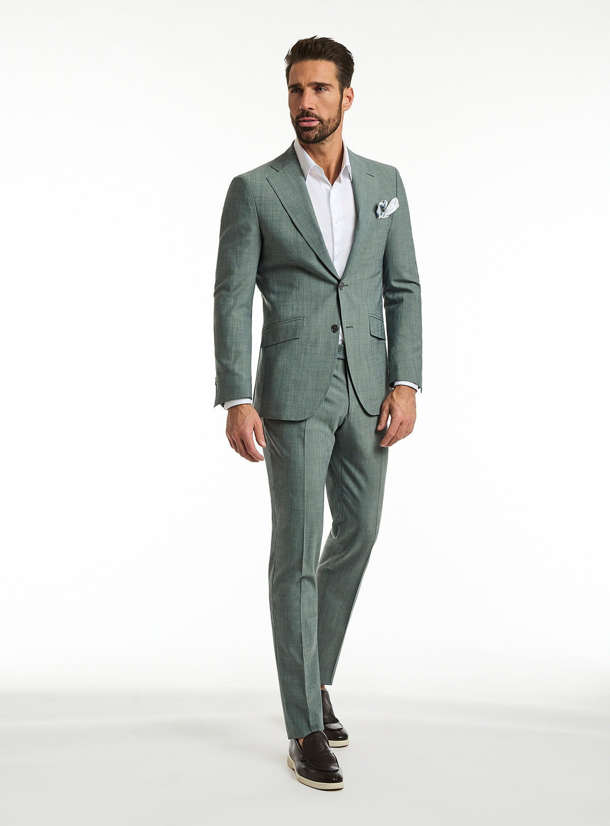 Consiglieri Catania Raffinata: textured sage green suit with a white shirt and patterned pocket square