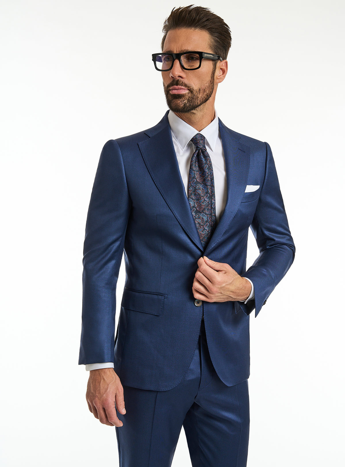 Consiglieri: blue suit with a white shirt and patterned tie