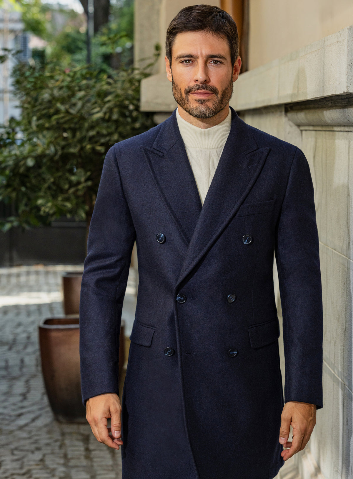 Consiglieri: navy double-breasted overcoat with an ivory roll-neck