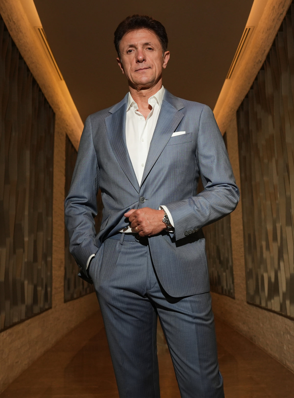 Light grey Consiglieri jacket worn with a white shirt and pocket square