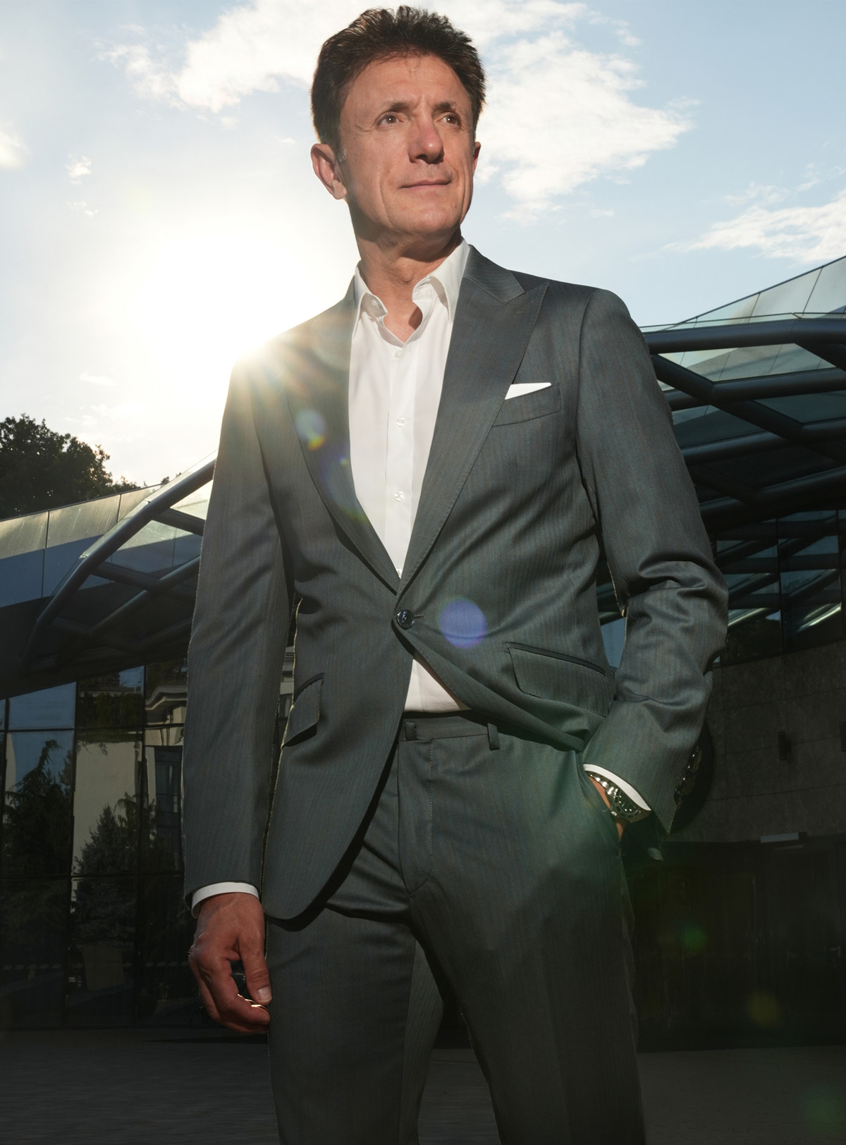 Grey-green Consiglieri jacket with a white shirt and pocket square