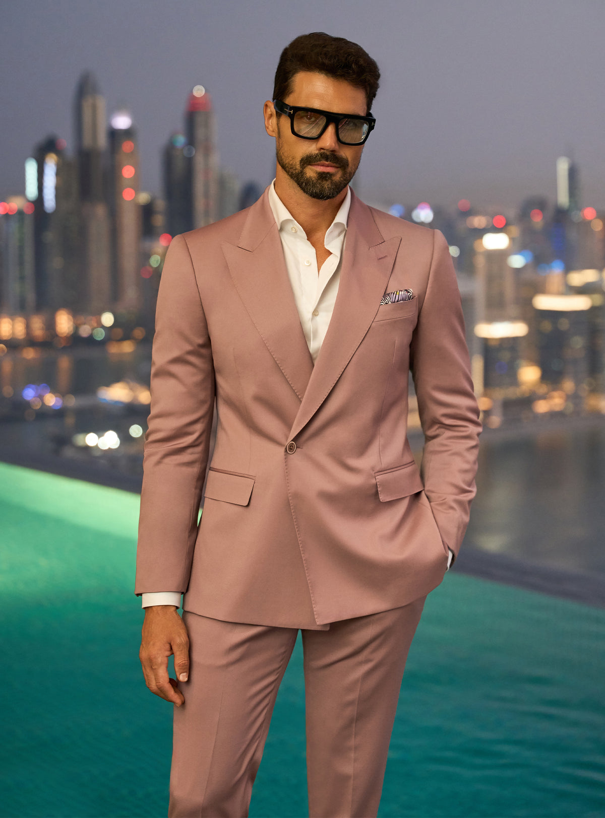 Consiglieri Radiant Nobility: powder pink suit with a white shirt and pocket square