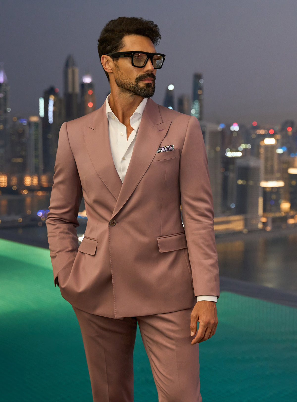 Consiglieri Radiant Nobility: powder pink suit with a white shirt and pocket square
