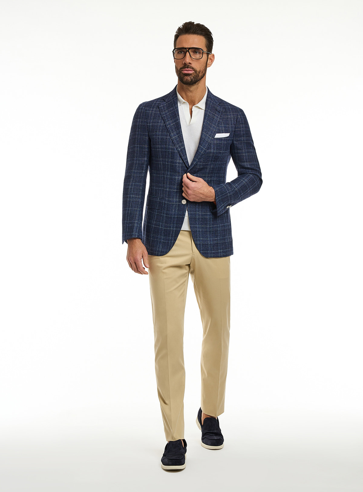 Consiglieri: navy checked jacket with a white polo and beige trousers
