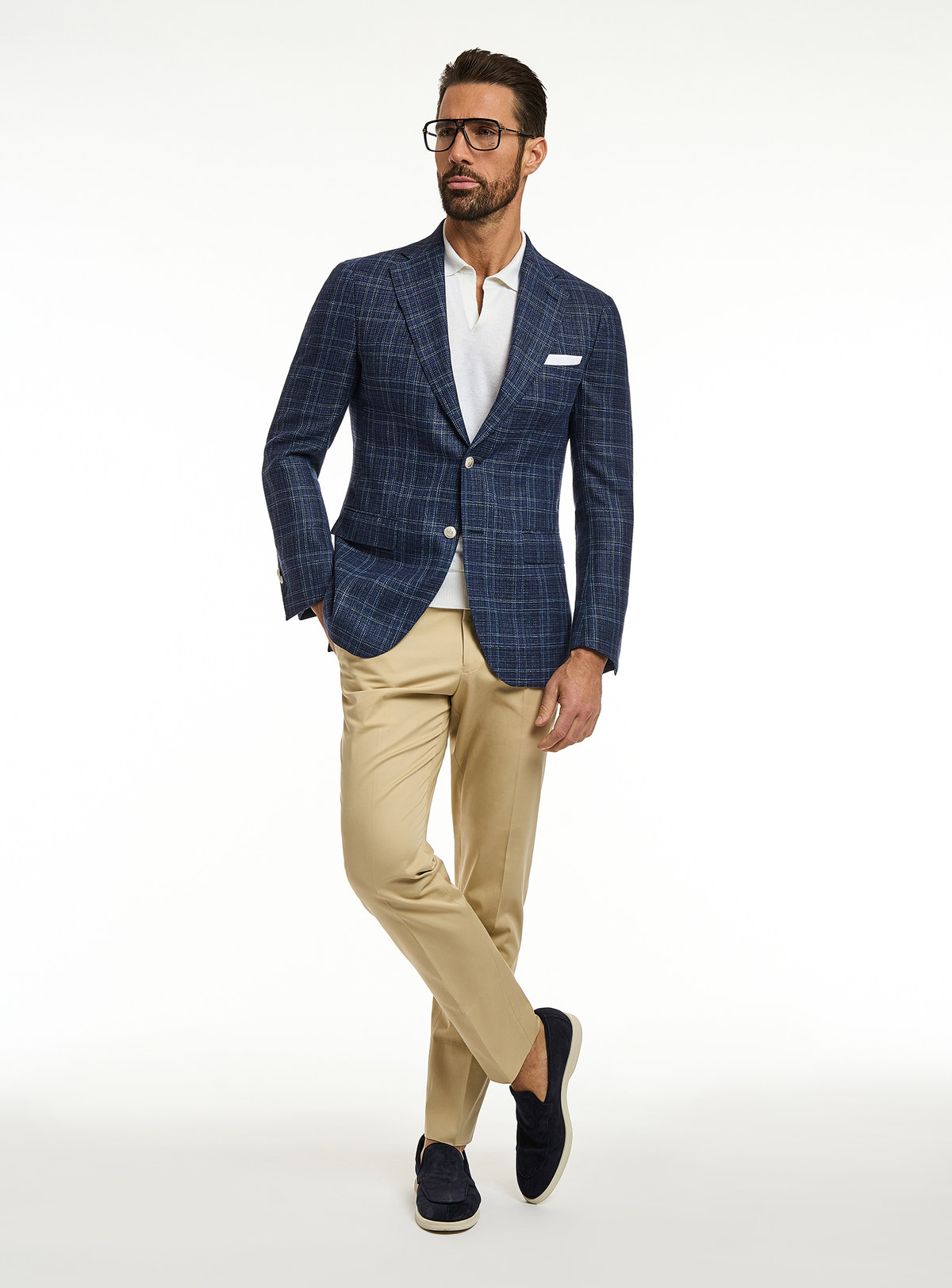 Consiglieri: navy checked jacket with a white polo and beige trousers