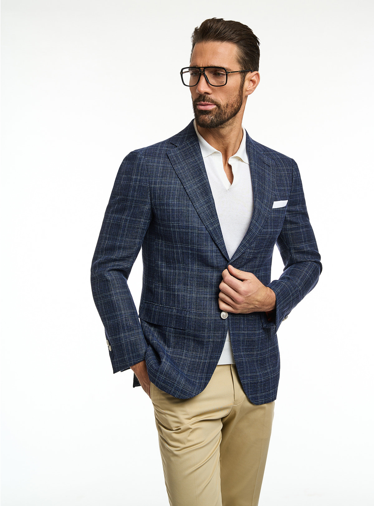 Consiglieri: navy checked jacket with a white polo and beige trousers