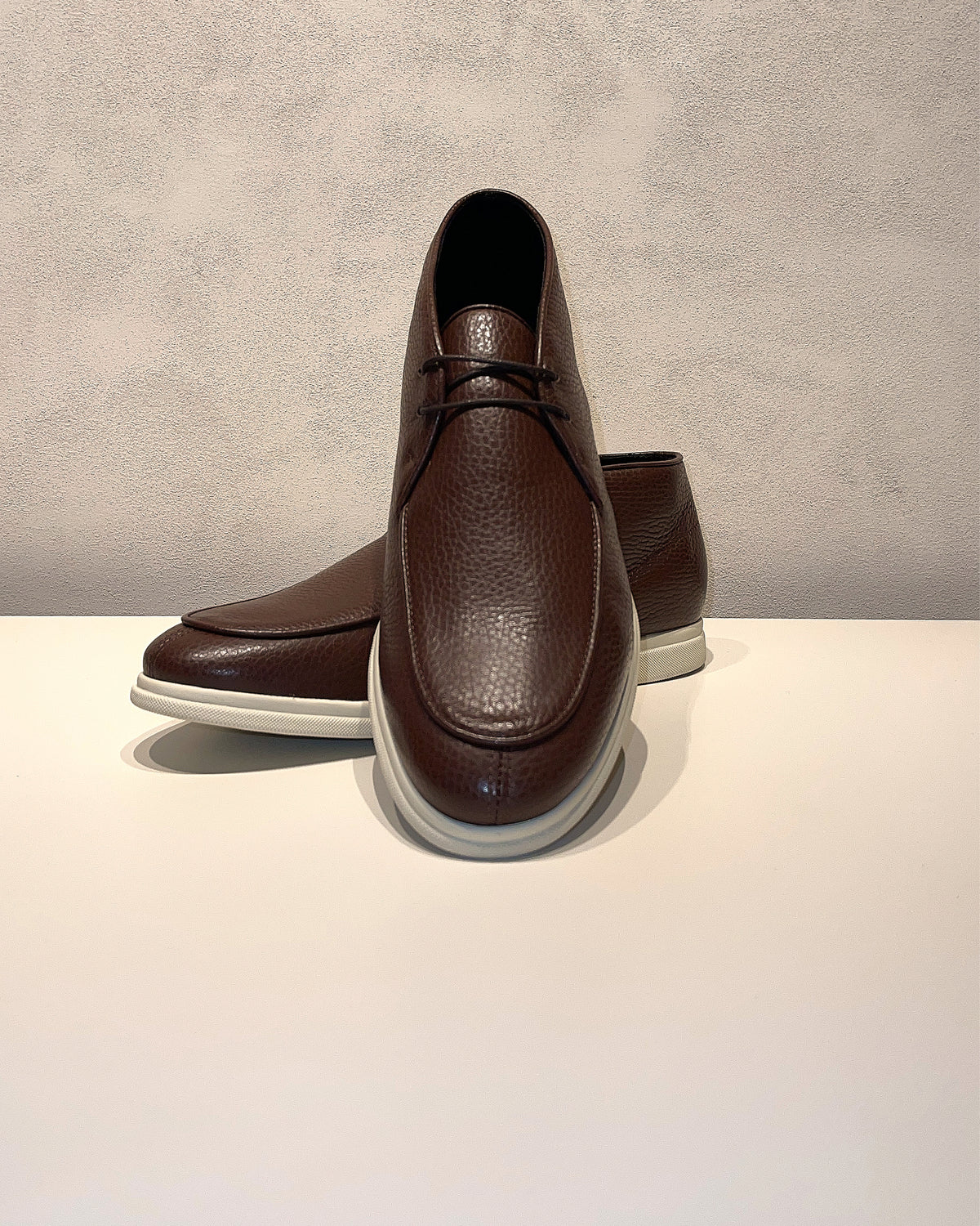 Consiglieri: laces and outlined stitching of the chocolate brown shoes