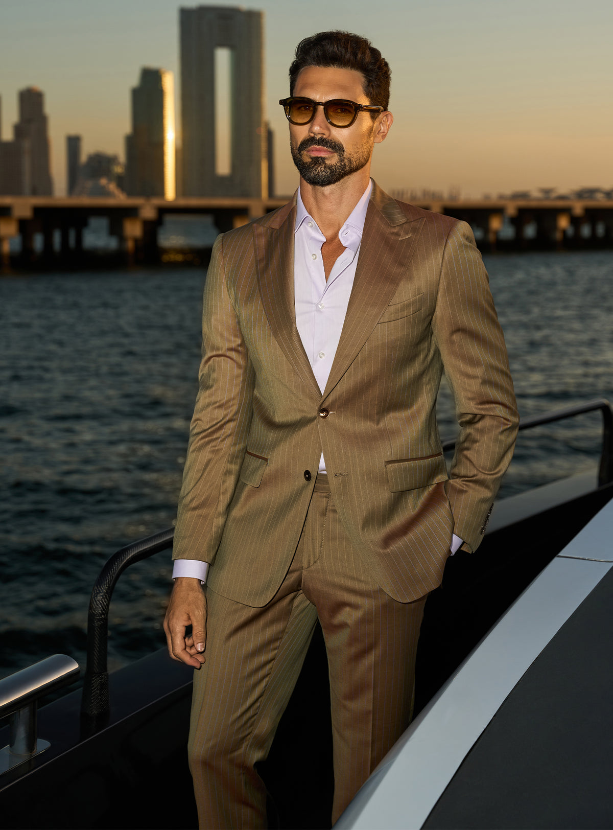 Consiglieri Imperial Grandeur: cognac suit with lustrous lapels and an open-collar white shirt