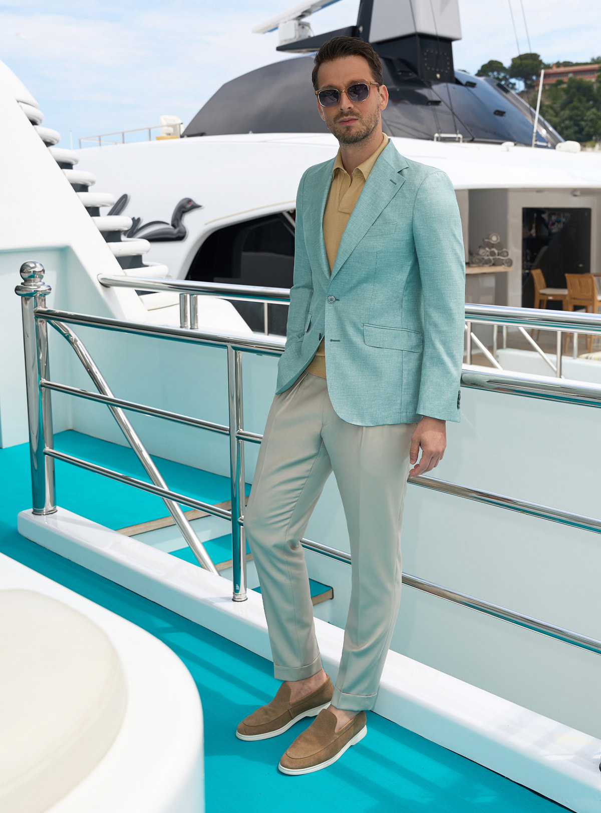 Mint green Consiglieri jacket styled with an ochre polo shirt and brown loafers