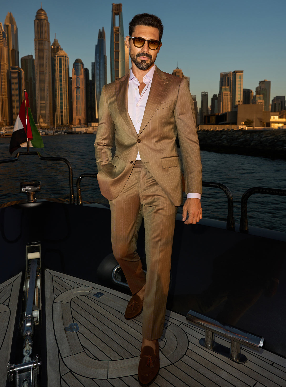 Consiglieri Imperial Grandeur: cognac suit with lustrous lapels and an open-collar white shirt