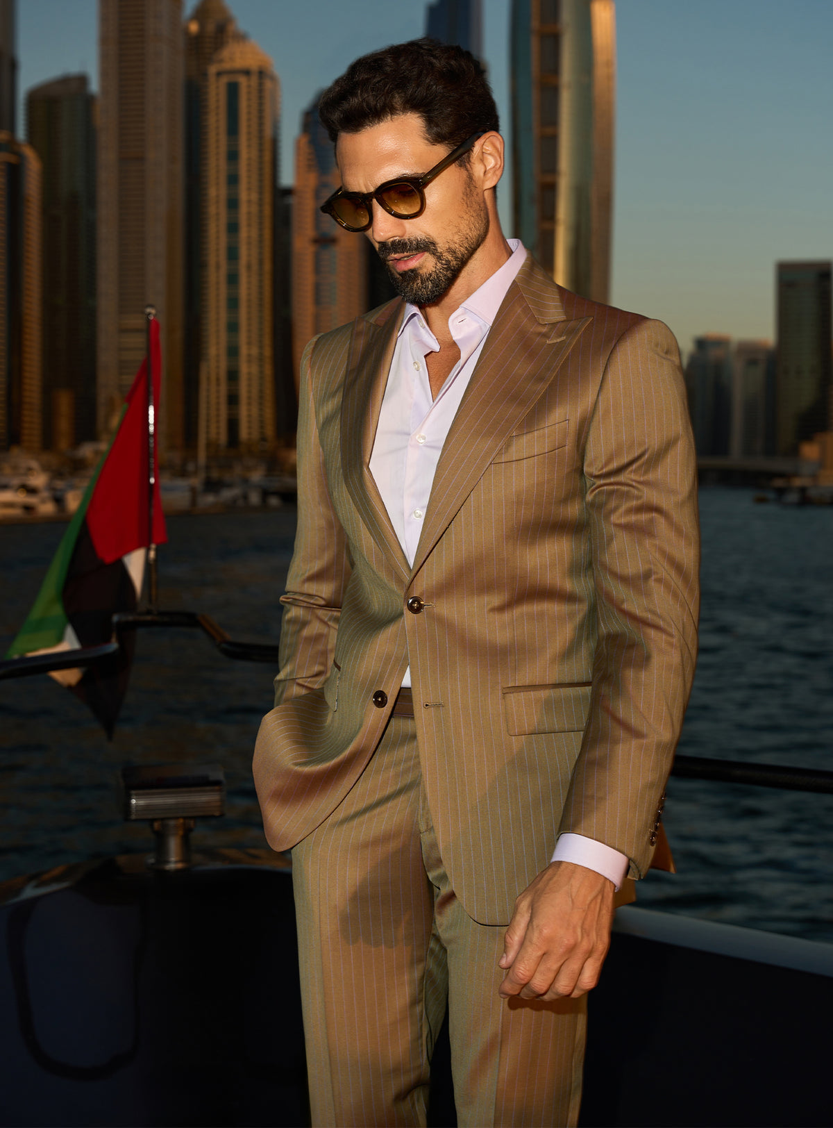 Consiglieri Imperial Grandeur: cognac suit with lustrous lapels and an open-collar white shirt