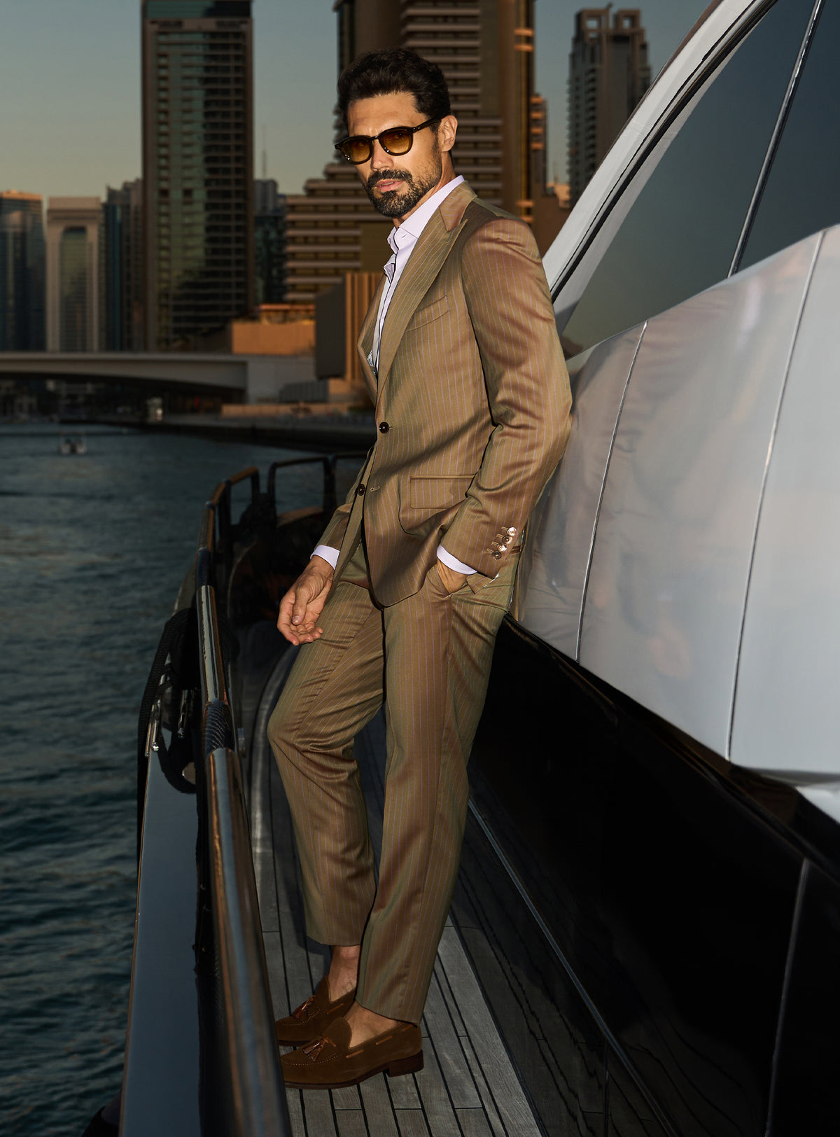 Consiglieri Imperial Grandeur: cognac suit with lustrous lapels and an open-collar white shirt