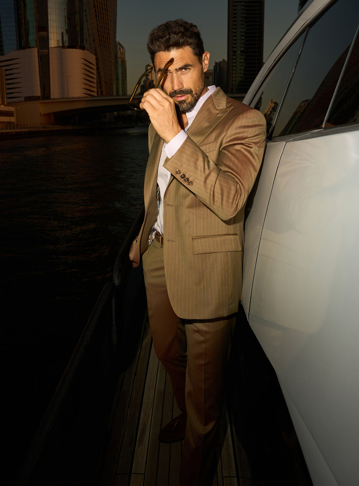 Consiglieri Imperial Grandeur: cognac suit with lustrous lapels and an open-collar white shirt