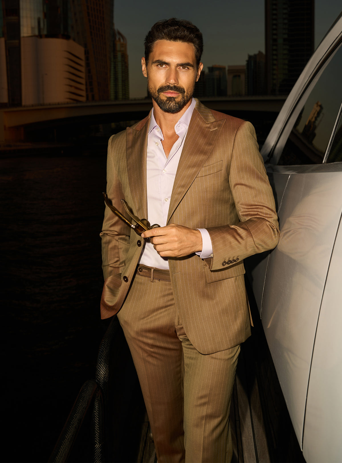 Consiglieri Imperial Grandeur: cognac suit with lustrous lapels and an open-collar white shirt