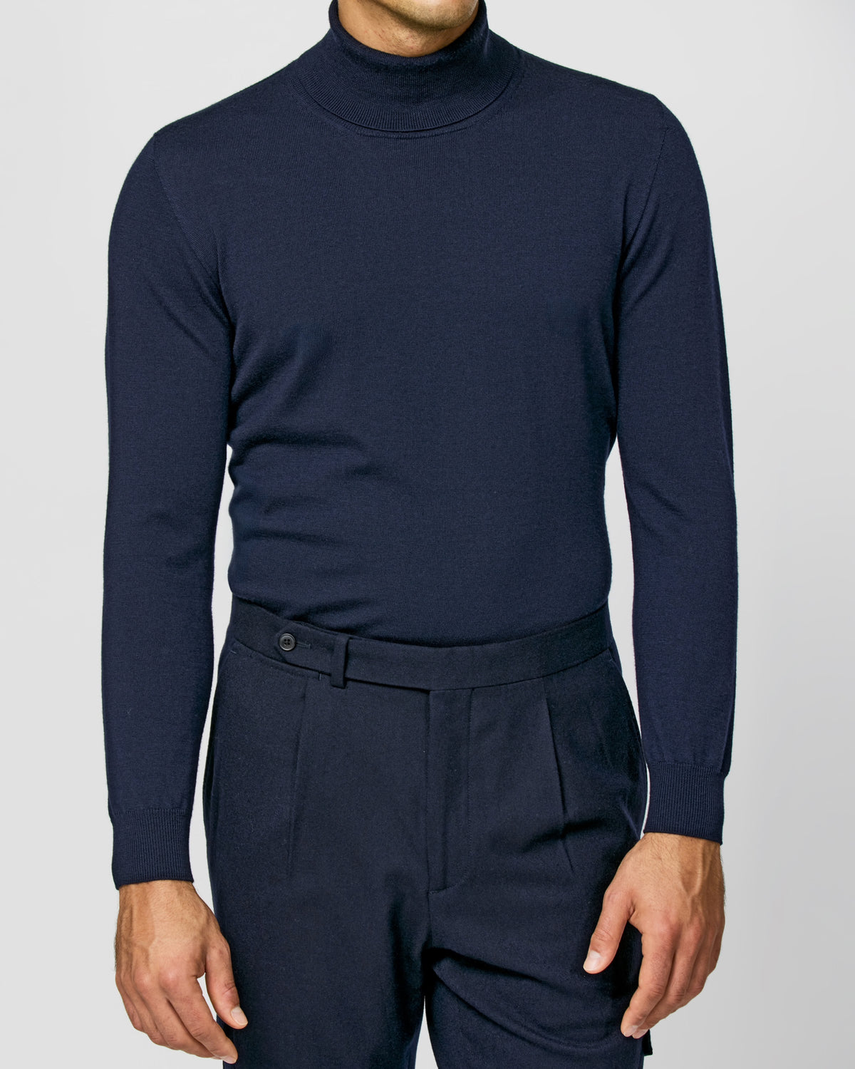 Navy Consiglieri turtleneck in a dark tonal ensemble
