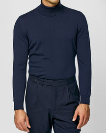 Navy Consiglieri turtleneck in a dark tonal ensemble
