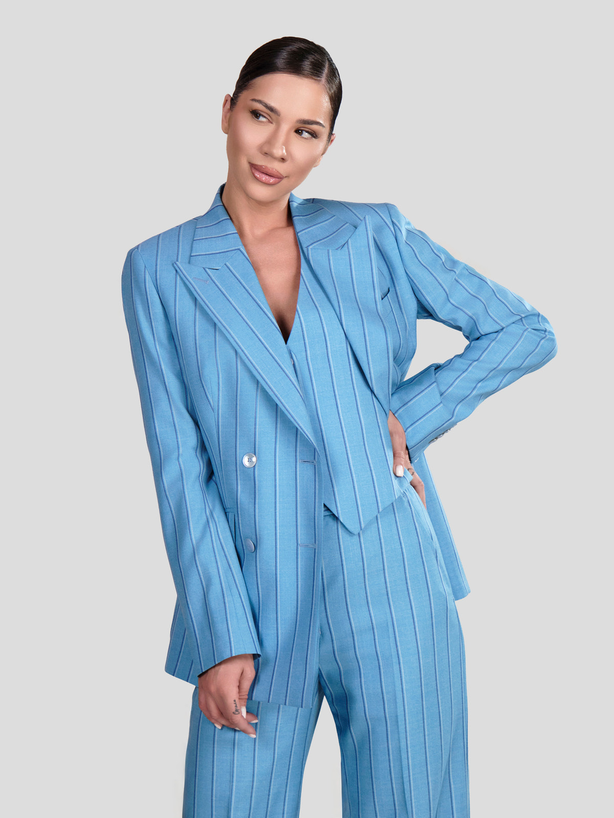Pale blue pinstriped three-piece Consiglieri DONNA women's suit with a double-breasted blazer