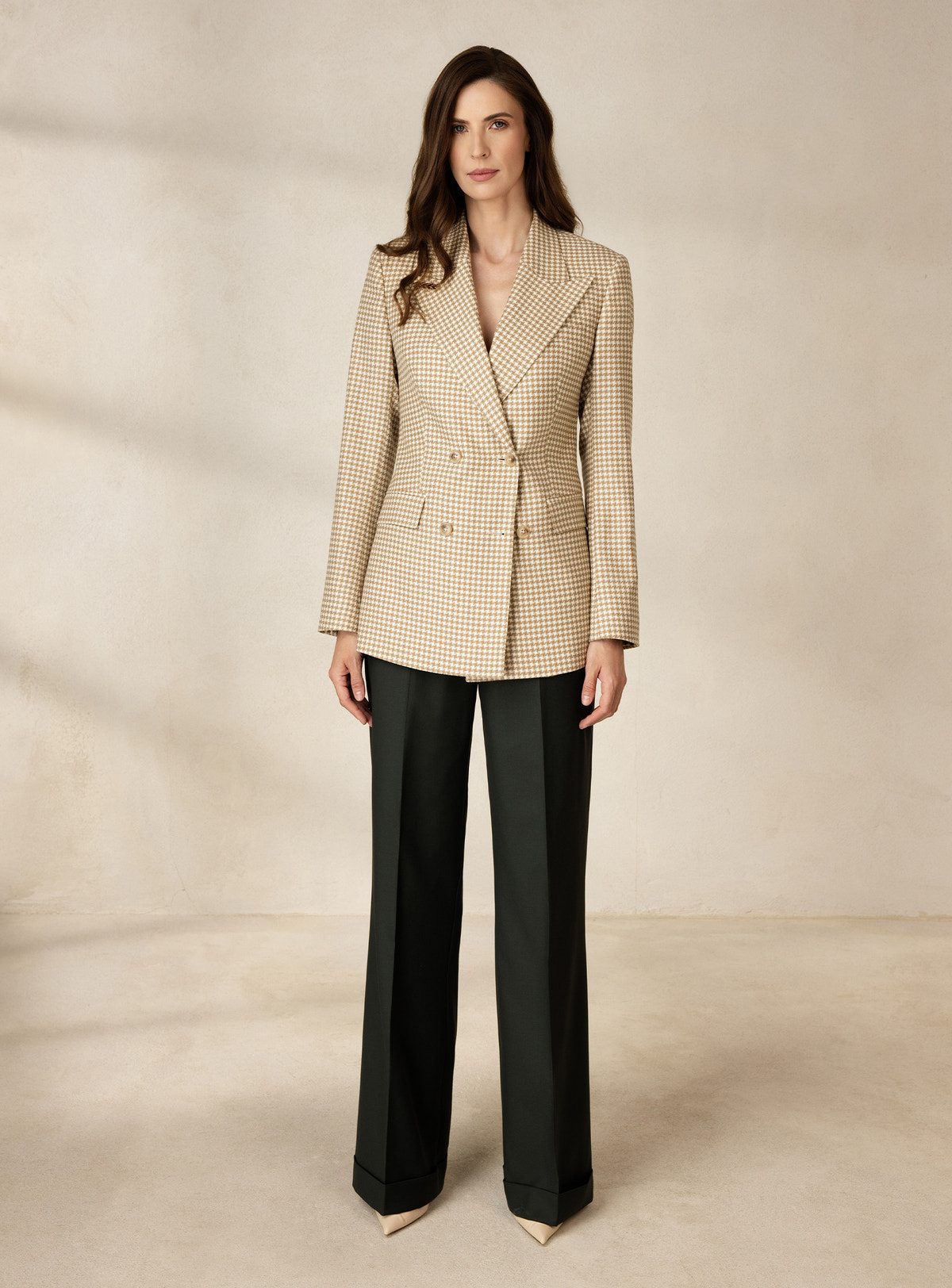 Beige patterned double-breasted Consiglieri DONNA blazer worn with dark green trousers