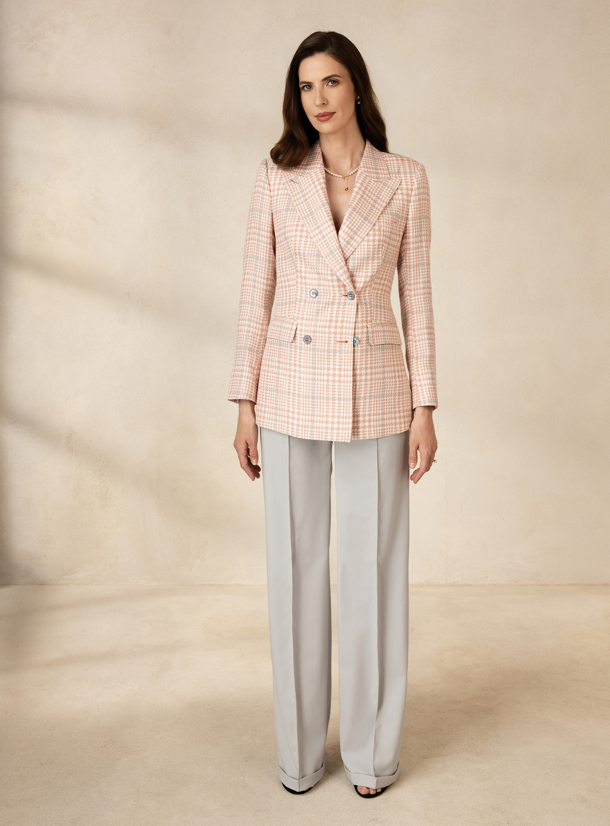 Pale pink checked Consiglieri DONNA blazer worn with light grey wide-leg trousers
