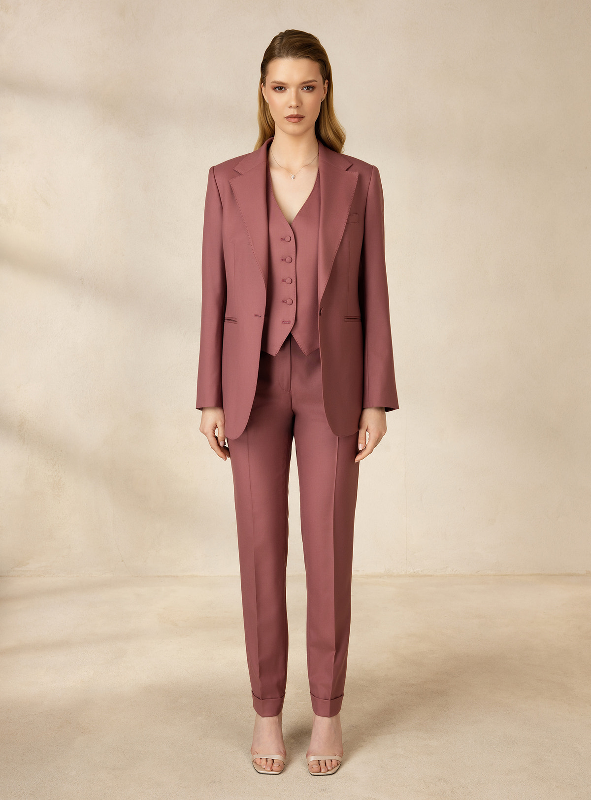 Deep rose three-piece Consiglieri DONNA suit with a waistcoat and tapered trousers