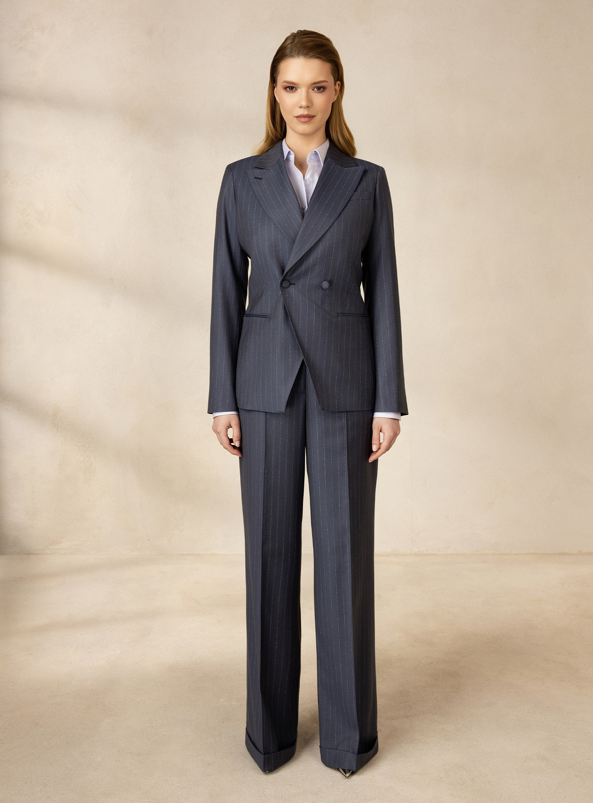 Blue-grey pinstriped Consiglieri DONNA suit with a fitted blazer and wide-leg trousers