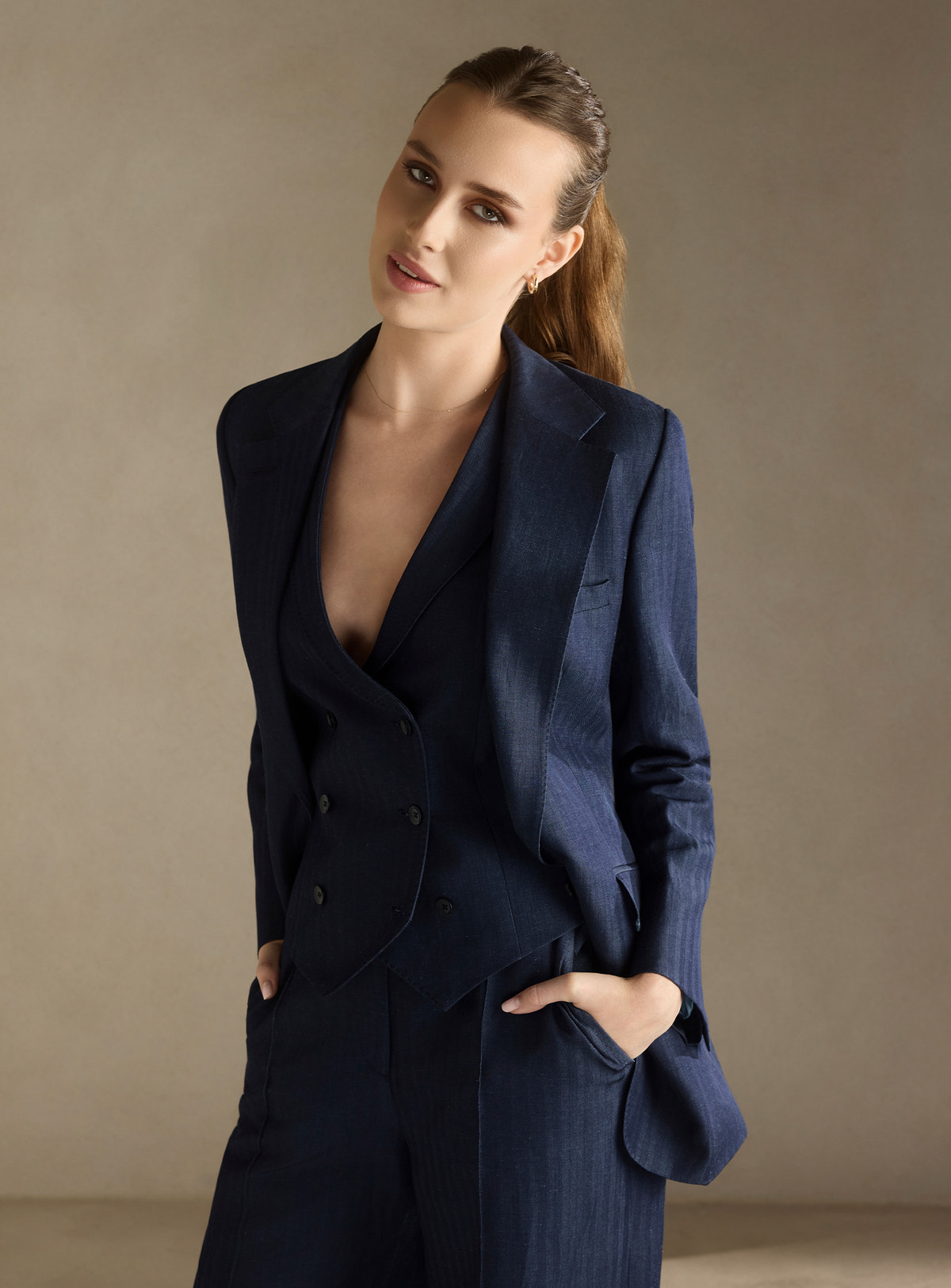Navy three-piece Consiglieri DONNA suit with a fitted blazer, waistcoat and wide-leg trousers