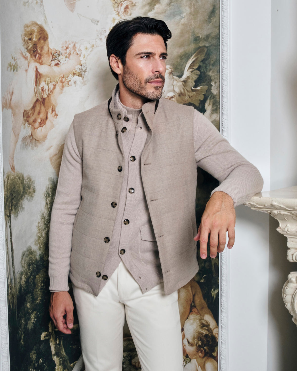Taupe Consiglieri cardigan with buttons and a stand collar, worn with white trousers