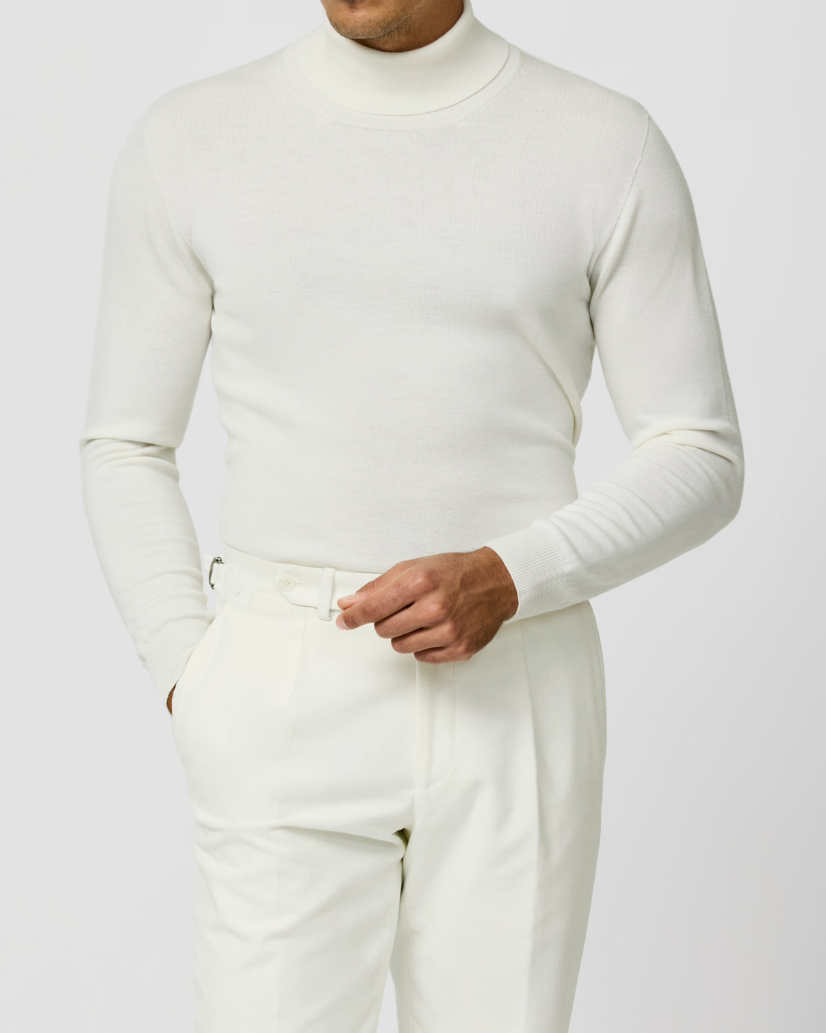 Off-white Consiglieri turtleneck worn with matching trousers