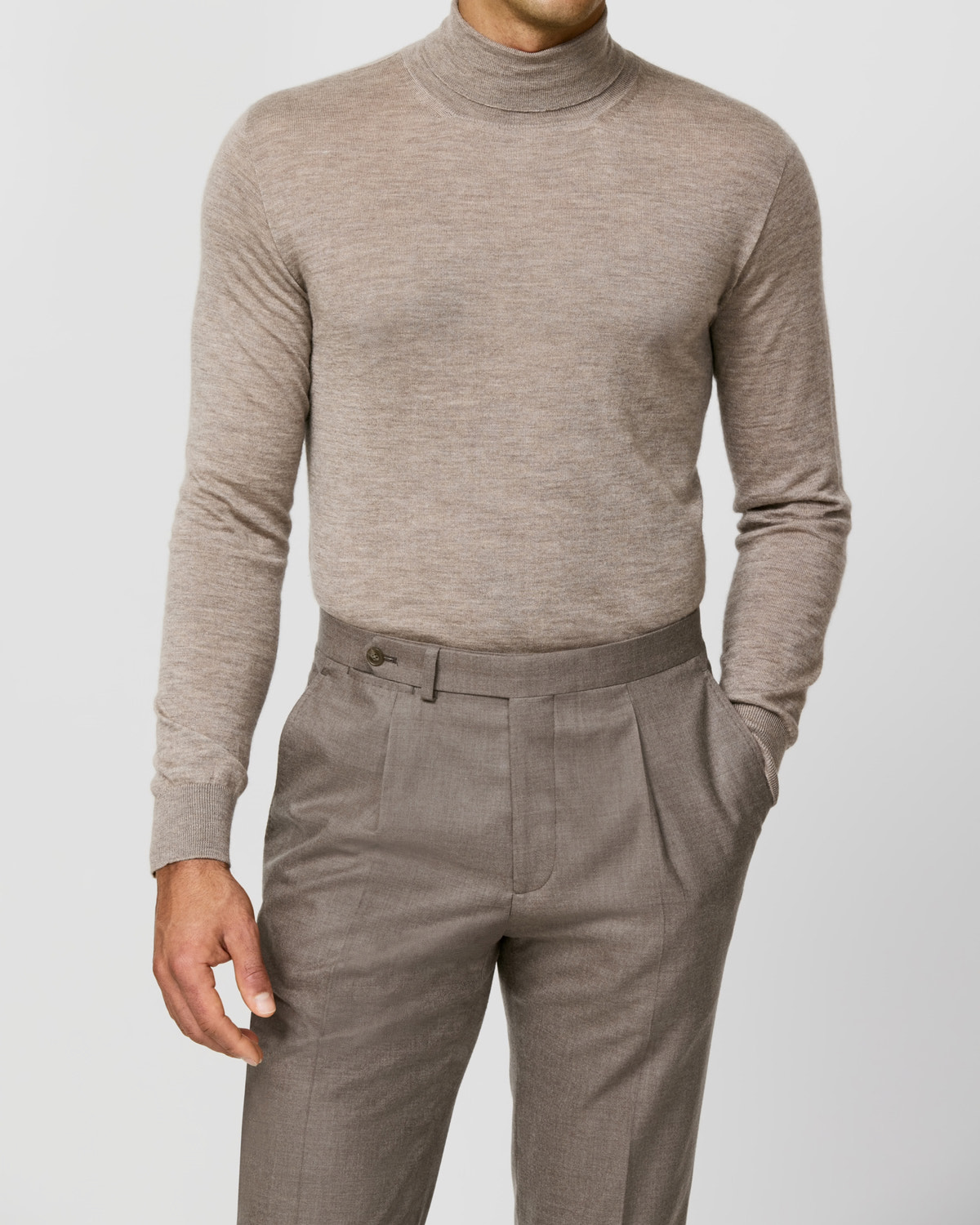 Taupe Consiglieri turtleneck worn with matching trousers