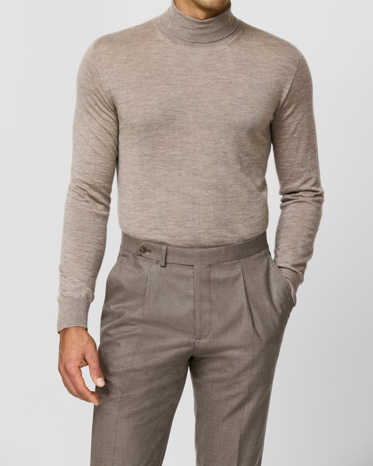 Taupe Consiglieri turtleneck worn with matching trousers