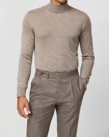 Taupe Consiglieri turtleneck worn with matching trousers