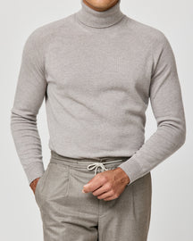 Greige Consiglieri turtleneck worn with drawstring trousers