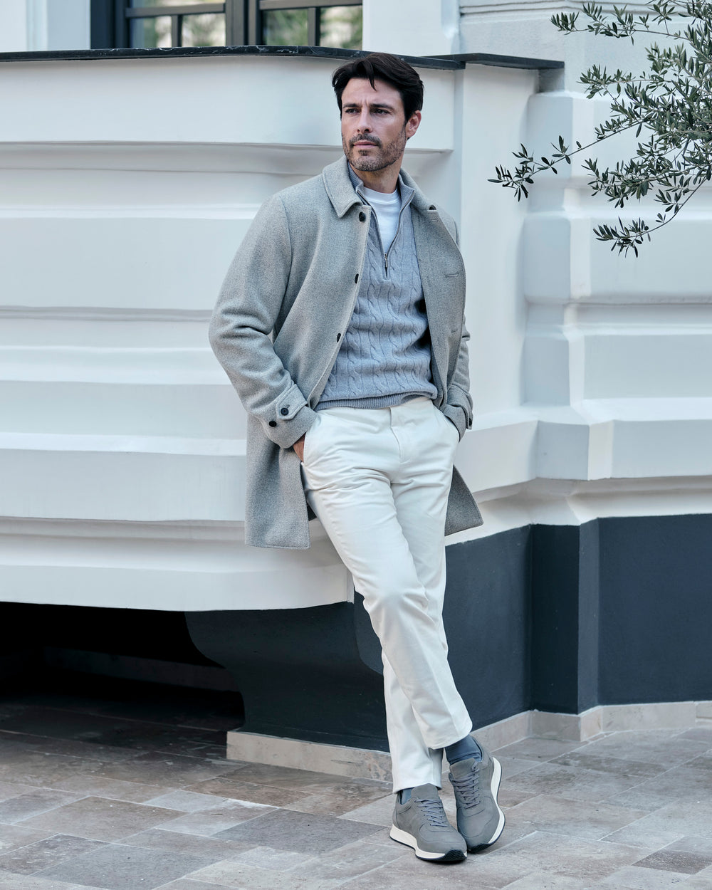 Light grey Consiglieri coat with a shirt collar, worn with white trousers