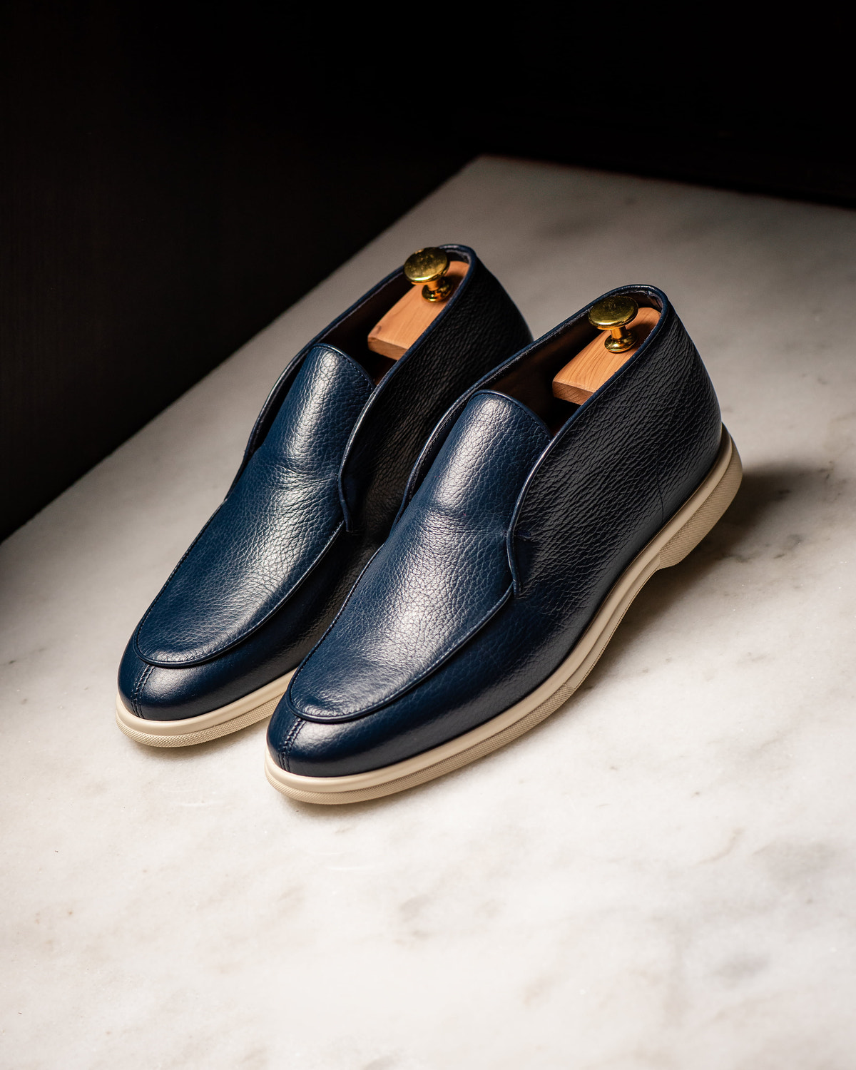 Consiglieri: navy mid-top loafers with a contrasting sole