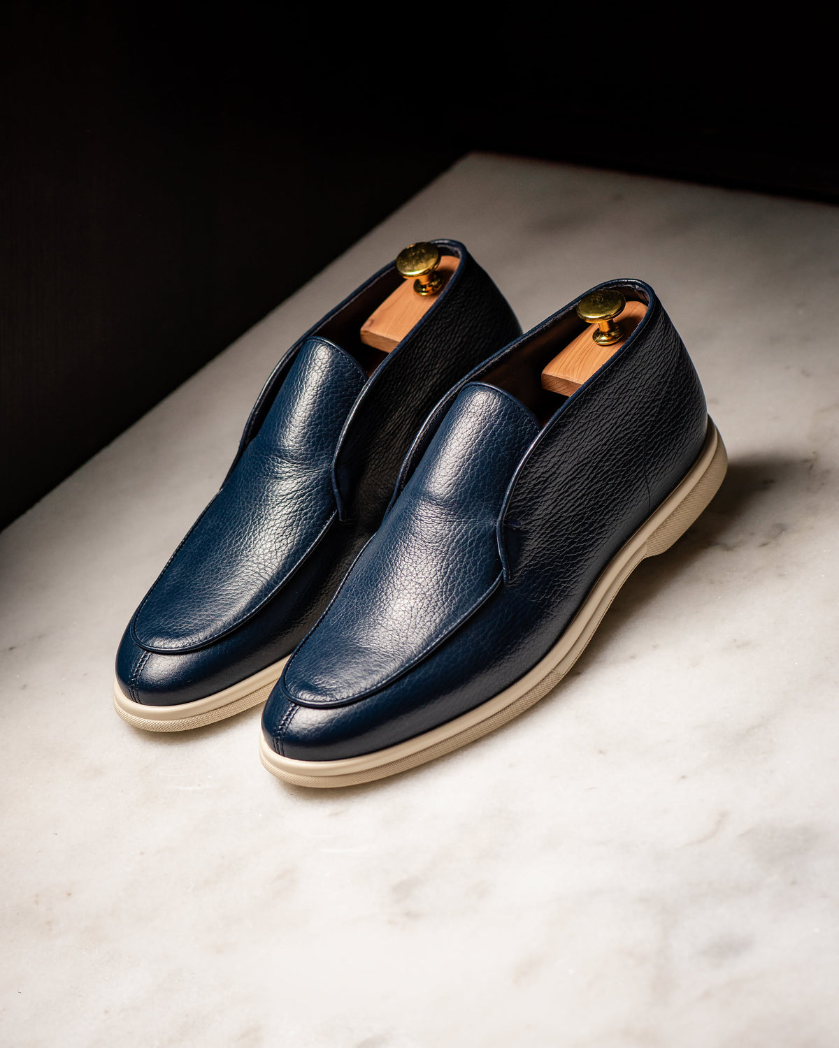 Consiglieri: navy mid-top loafers with a contrasting sole
