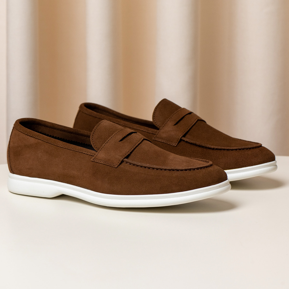 Consiglieri: brown penny loafers with a velvety texture and white soles
