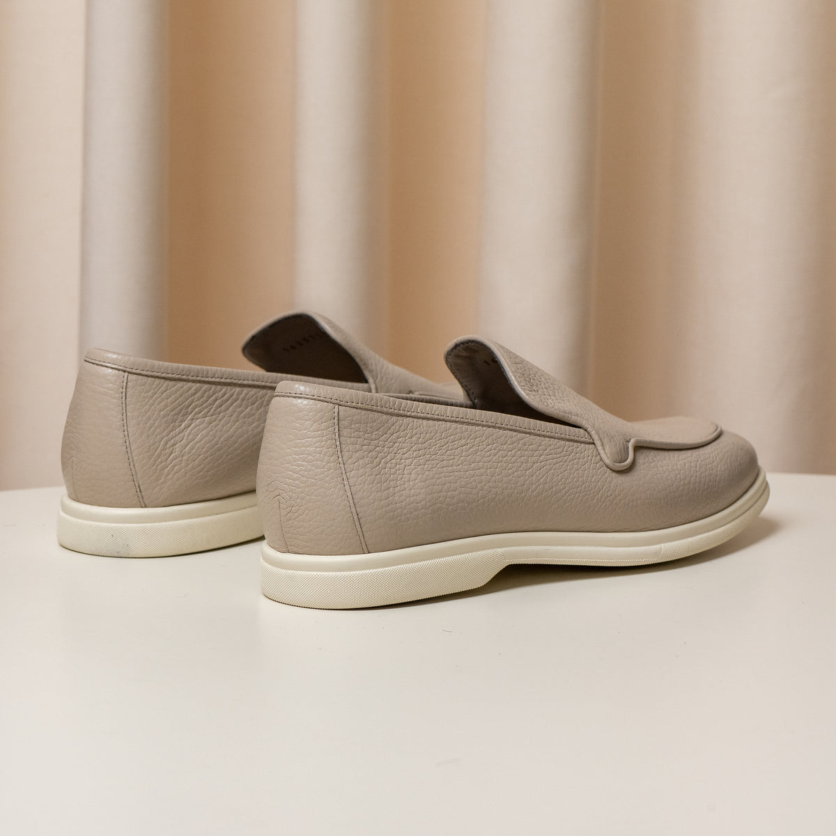 Consiglieri: heel and cream sole of the beige loafers