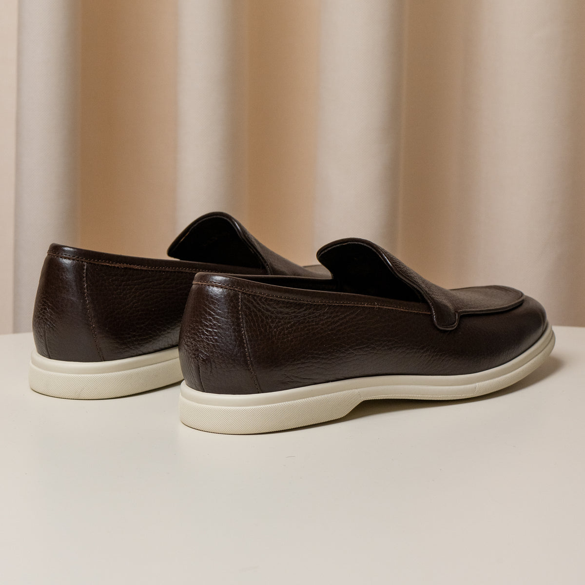 Consiglieri: heel and cream sole of the dark brown loafers