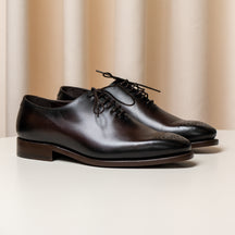 Consiglieri: dark brown Oxford shoes with an elongated shape and laces