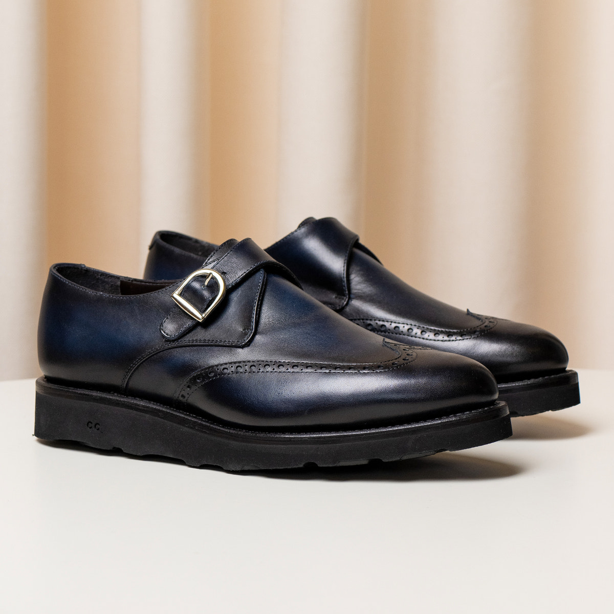 Consiglieri: navy single-monk shoes with decorative broguing