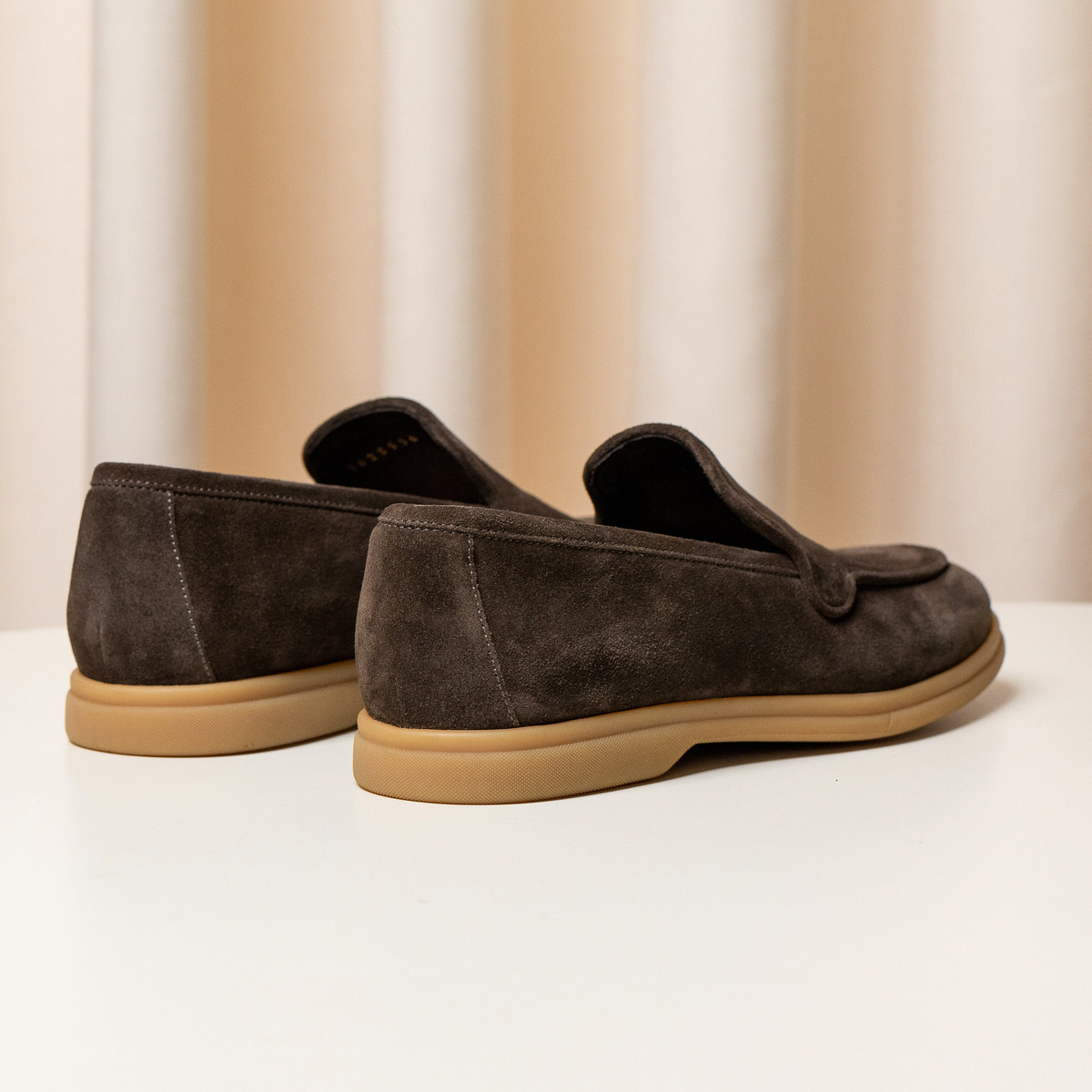 Consiglieri: heel and caramel sole of the chocolate brown loafers