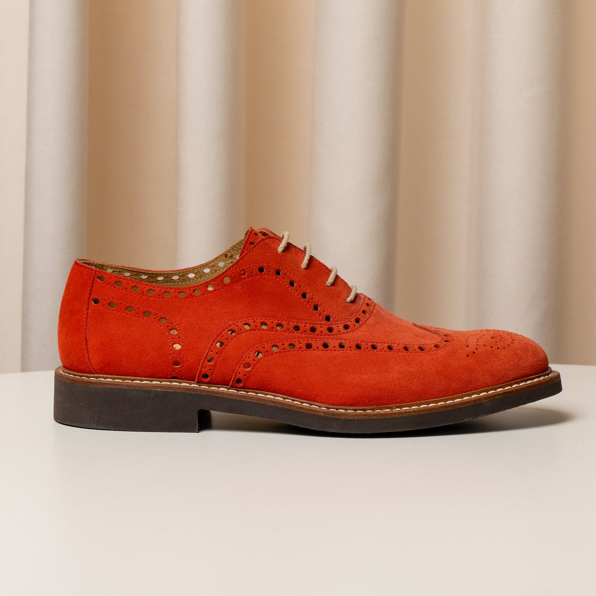 Consiglieri: orange Derby shoes with decorative broguing and a velvety texture