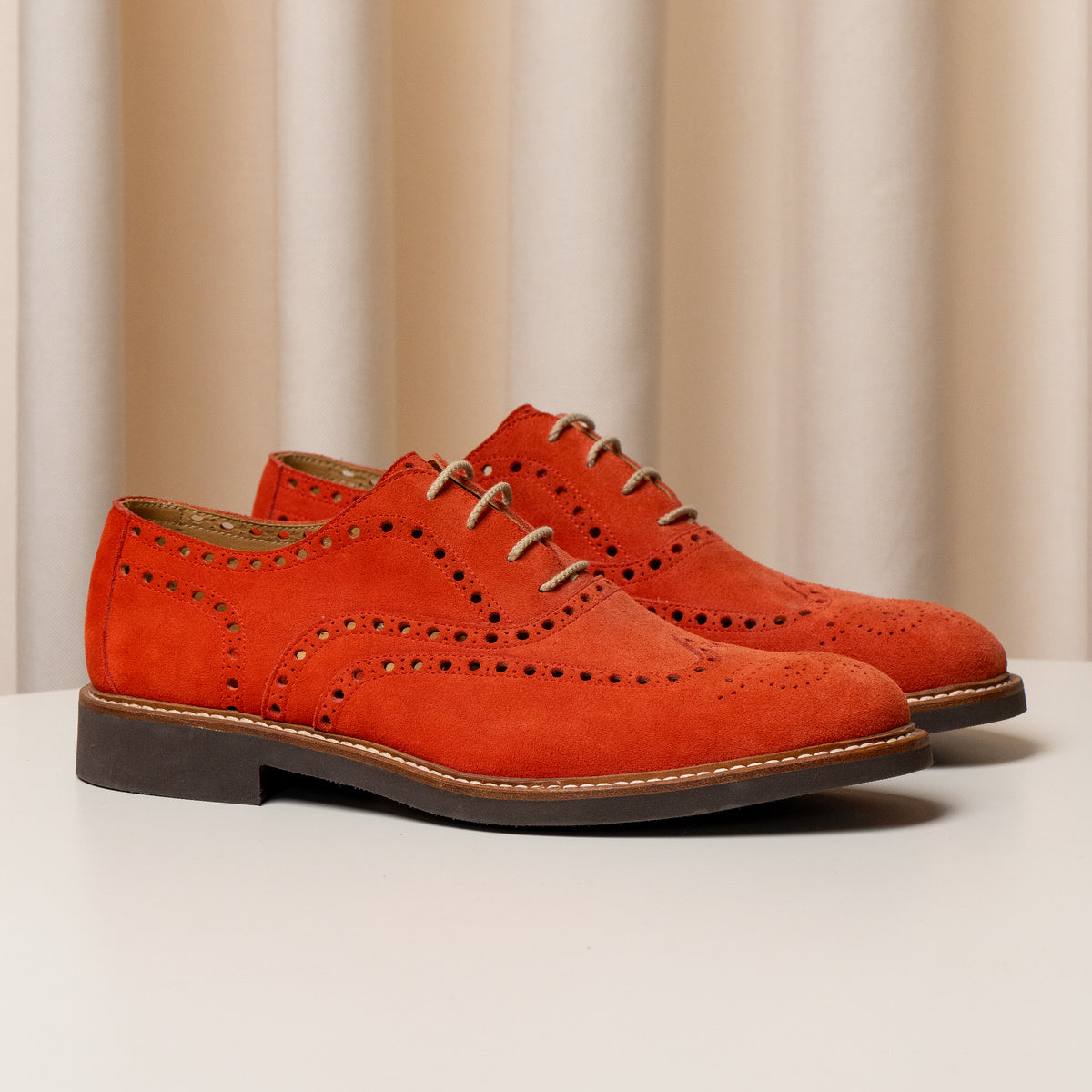 Consiglieri: orange Derby shoes with decorative broguing and a velvety texture